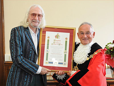 Charlie receiving award