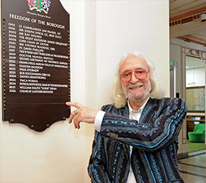 Charlie with board of previous winners